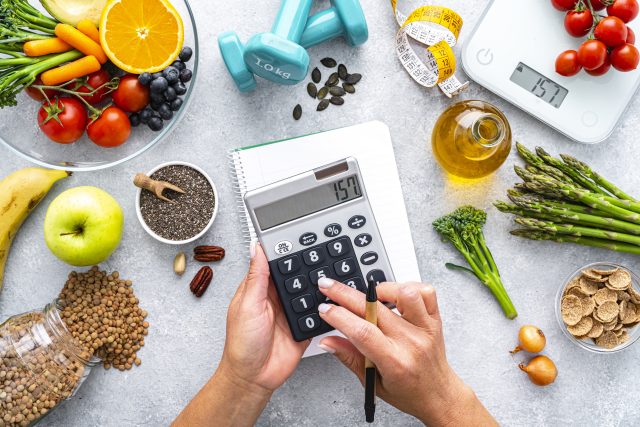 Woman calculating food calories